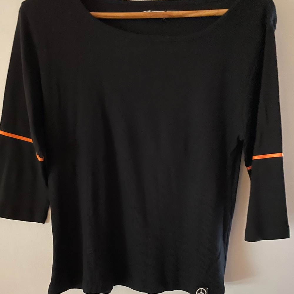 Dorin Frankfurt black 3/4 sleeve SZ M/L top with Orange detailing on the sleeve.
